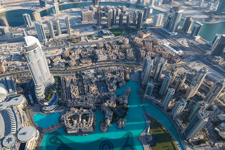 aerial-view-dubai-city-from-top-tower_268835-1059