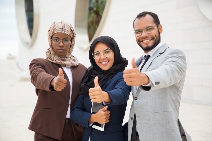 multicultural-business-group-posing-making-like-gesture_74855-2049