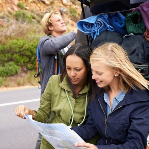 happy-woman-friends-map-with-car-navigation-destination-road-trip-travel-together-female-person-young-group-preparing-vehicle-with-luggage-document-location-direction_590464-292676-1 (1)